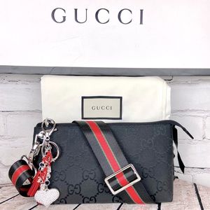 Gucci black canvas pouch crossbody with charm and dust bag